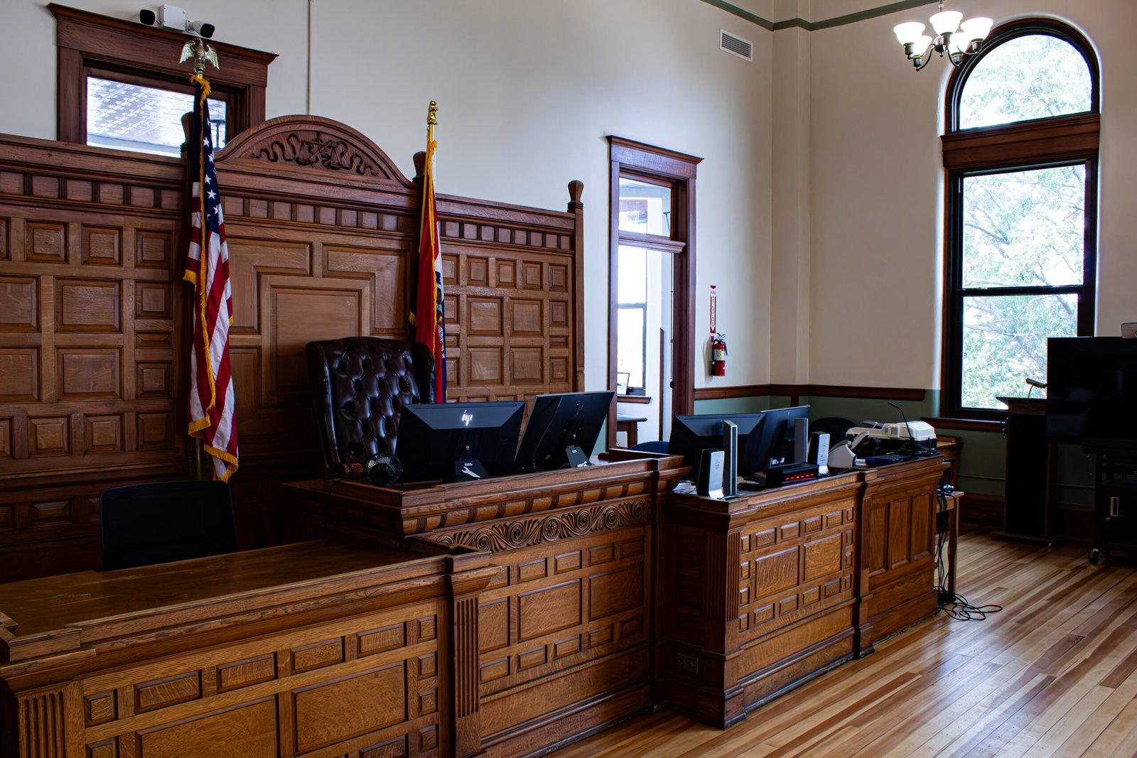 A courtroom with american flags